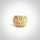 Hand carved woolly mammoth tusk tribal face ring. Ancient Mammoth Tusk ring with face design. Hand made ring, delivered with international airmail. Postage is included. Unique large Woolly Mammoth Tusk ring.
